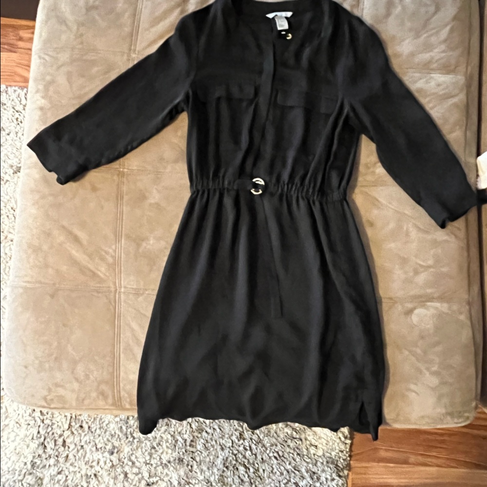 Black dress with gold buckle and buttons.